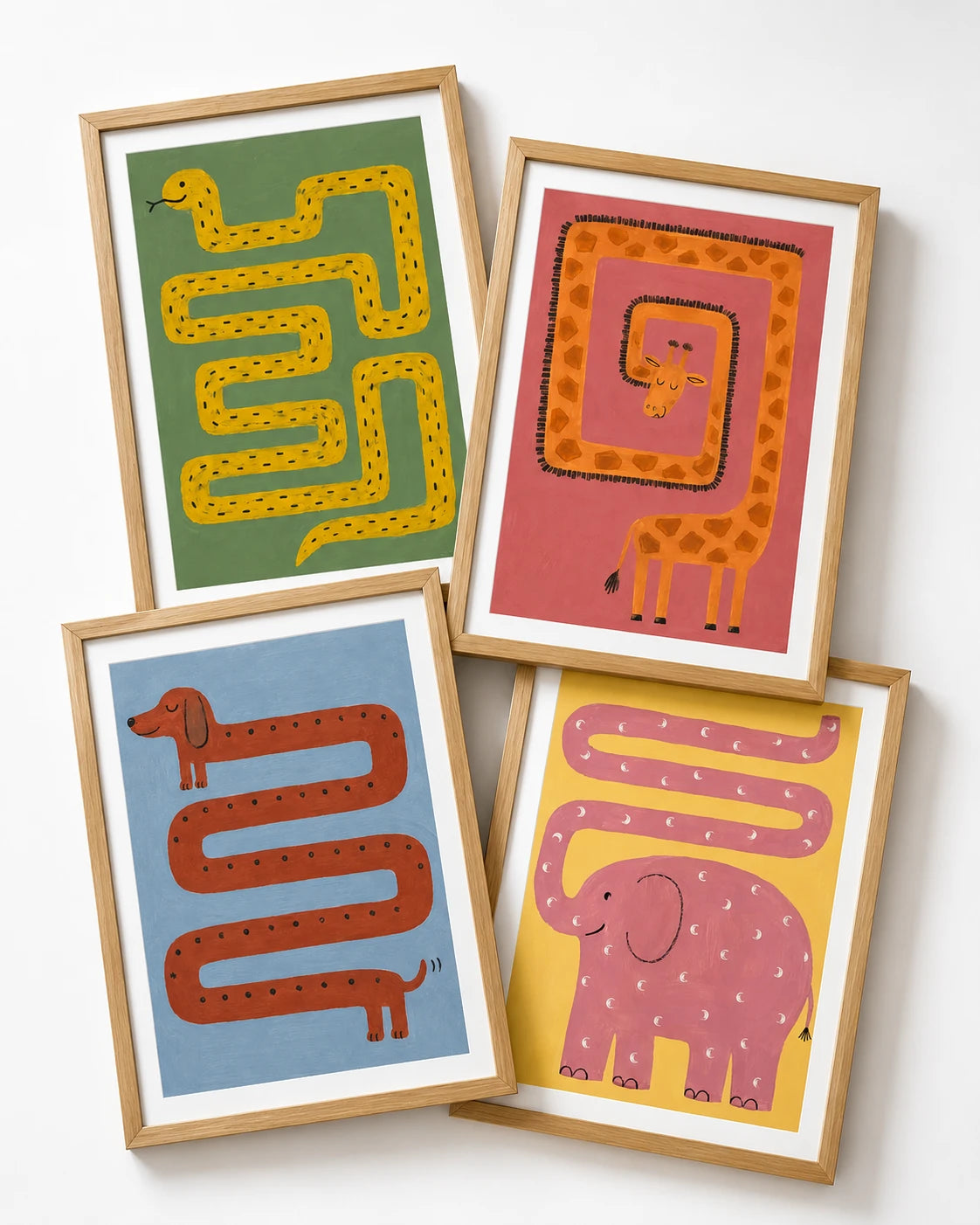 Vier gerahmte Kringeltier-Poster: Schlange, Giraffe, Dackel und Elefant